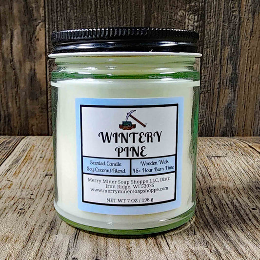 soy coconut wax candle with wooden wick scented as wintery pine