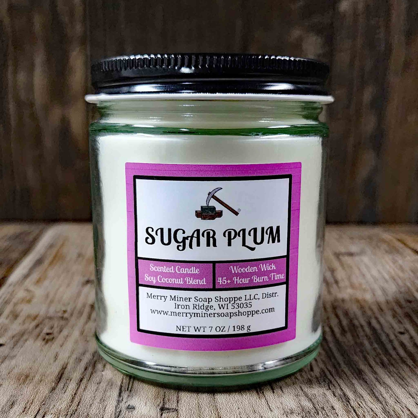 soy coconut wax candle with wooden wick scented as sugar plum