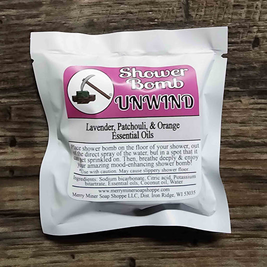 shower bomb scented as unwind lavender patchouli orange