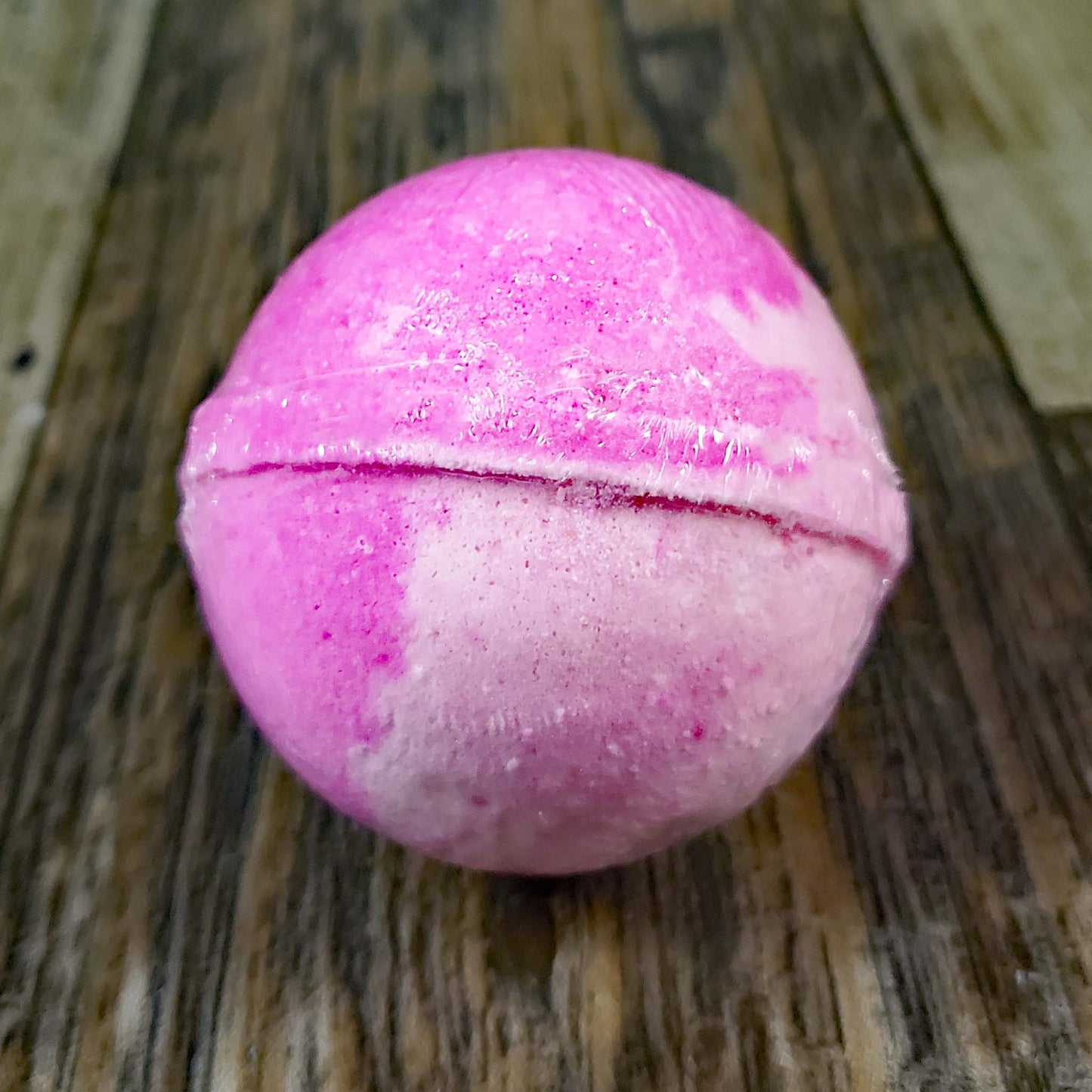 natural bath bomb scented as pear raspberry